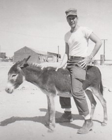 Duane Hafer riding donkey in Morocco